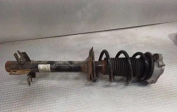 Front shock absorber with coil spring