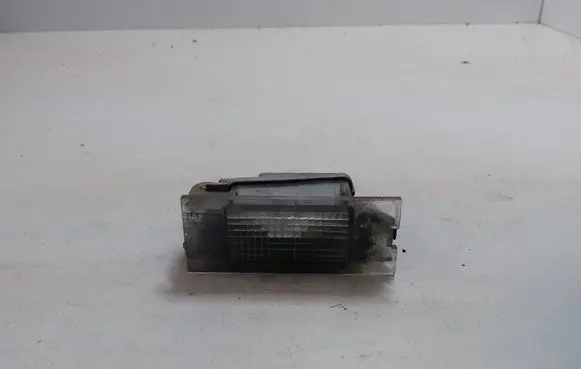Renault Laguna II Number plate light 7700796163