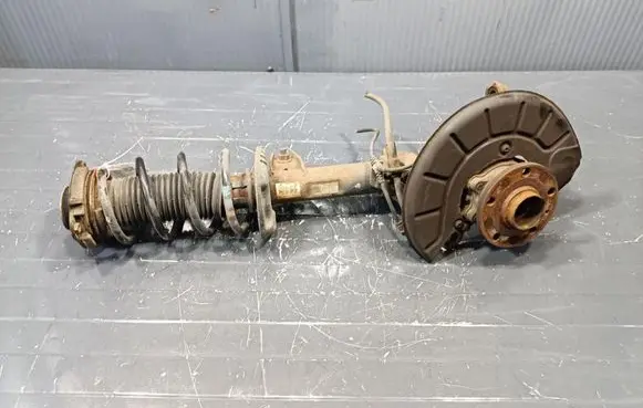 Skoda Octavia Mk2 (1Z) Front shock absorber with coil spring
