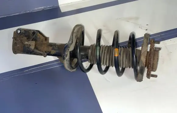 Mazda Premacy Front shock absorber with coil spring