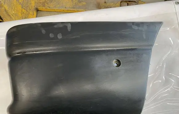 Rear bumper corner part panel trim