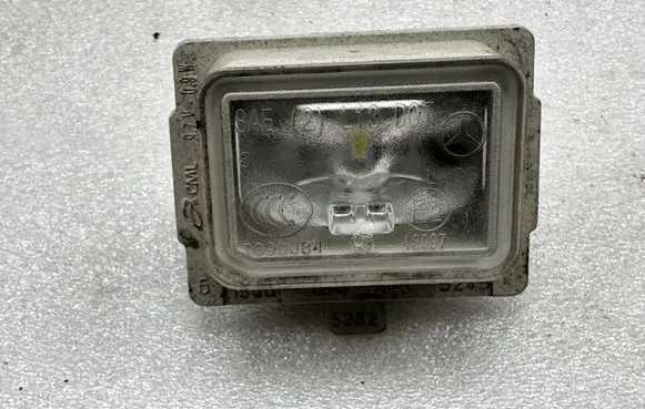 Mercedes-Benz GL X166 Number plate light A0999067000