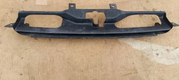 Engine bonnet/hood lock trim molding