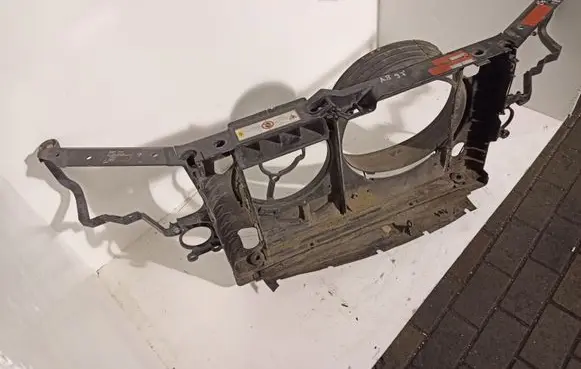 Radiator support slam panel