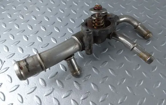 Thermostat/thermostat housing