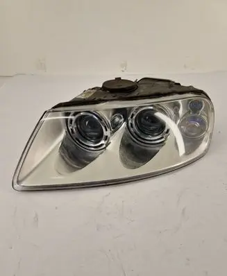 Volkswagen Touareg I Headlight/headlamp 7L6941017BG