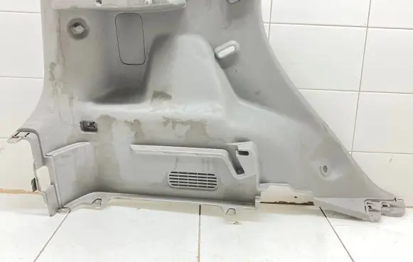 Trunk/boot lower side trim panel
