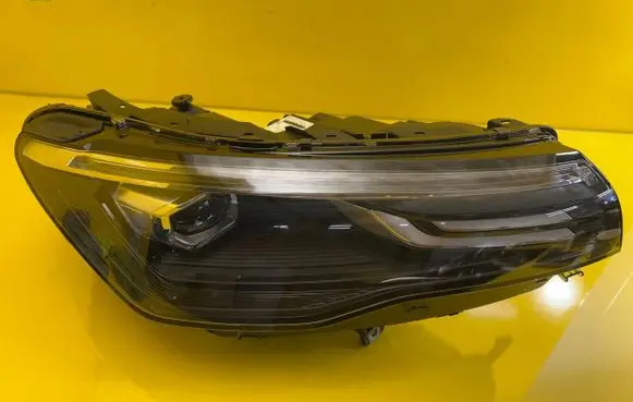 Volkswagen Tiguan Headlight/headlamp 571941006B