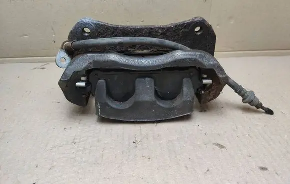 Toyota Sienna XL30 III Front brake caliper