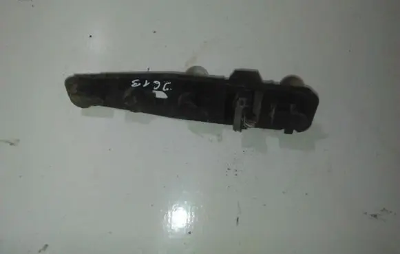 Tail light bulb cover holder