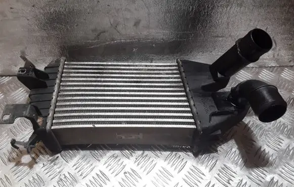 Opel Zafira B Intercooler radiator 13213402