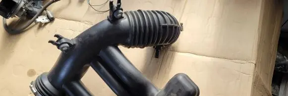 Jeep Wrangler Air intake hose/pipe 04627065AD