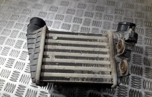 Volkswagen Golf III Intercooler radiator 1h0145755