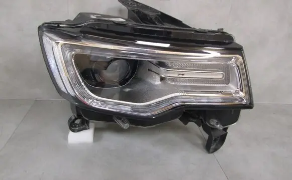 Jeep Grand Cherokee Headlight/headlamp 68266664AE T77621B 337223