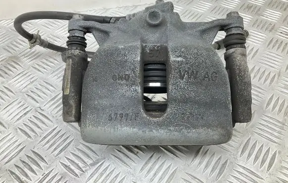 Volkswagen Tiguan Front brake caliper 6799F