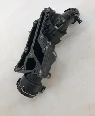 Thermostat/thermostat housing