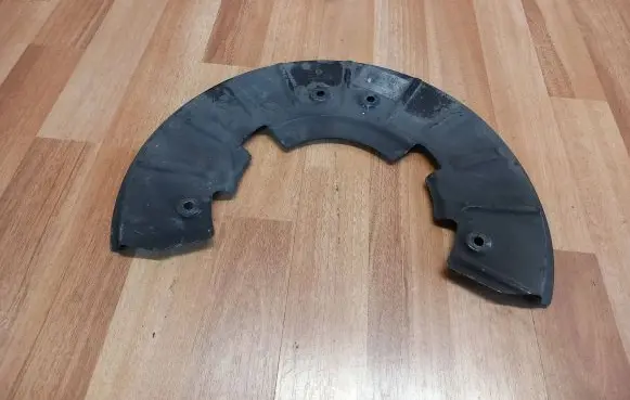 Volkswagen Touareg I Front brake disc dust cover plate 7L0615311B