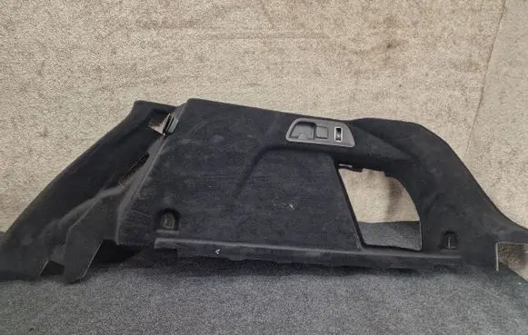 Trunk/boot lower side trim panel