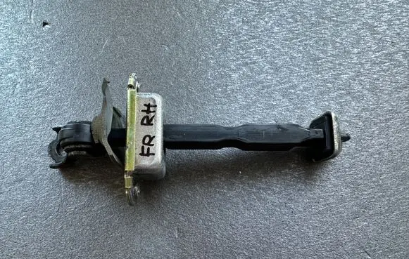 Nissan Patrol Y61 Front door check strap stopper 80430VB000