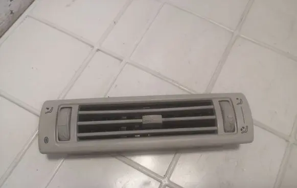 Dash center air vent grill