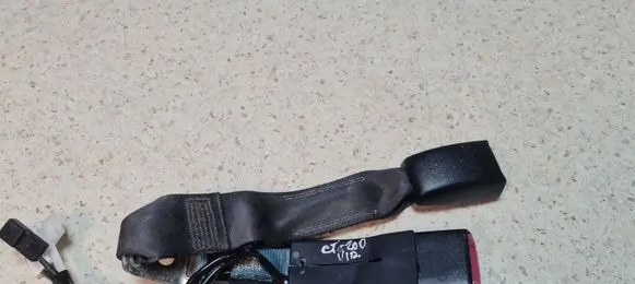 Middle seatbelt buckle (rear)