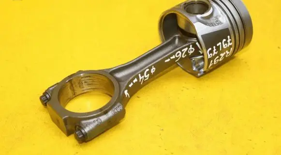 Piston with connecting rod
