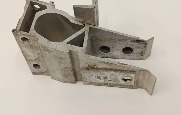 Radiator support slam panel bracket