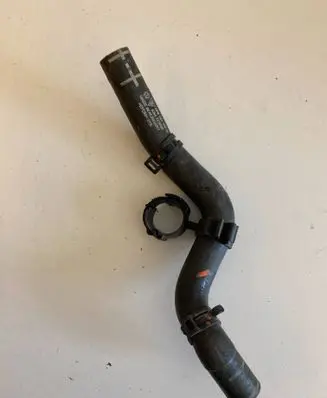 Volkswagen Touareg II Engine coolant pipe/hose 7P6121157D