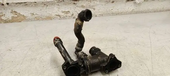 Thermostat/thermostat housing