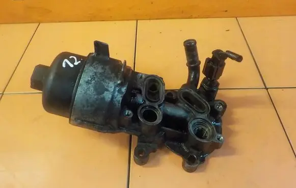 Ford Mondeo MK IV Oil filter mounting bracket FL515