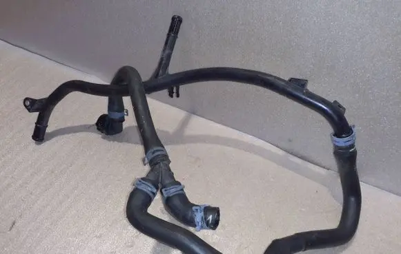 Volkswagen Golf VII Engine coolant pipe/hose 04E121070AC