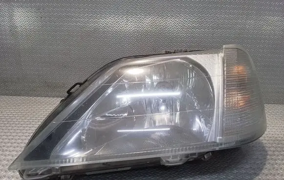 Dacia Logan I Headlight/headlamp 8200211005
