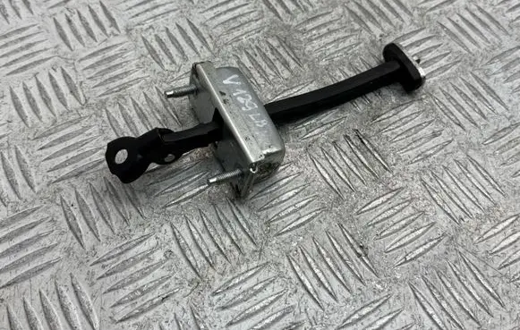 Front door check strap stopper