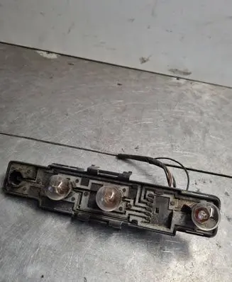 Tail light bulb cover holder