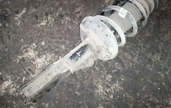 Front shock absorber with coil spring