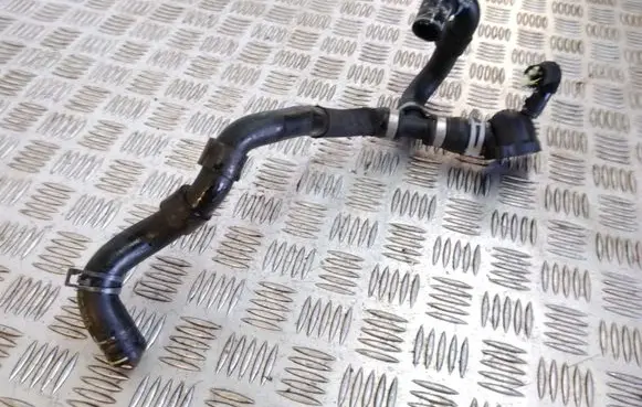 Volkswagen Golf VII Engine coolant pipe/hose 04L121131AB