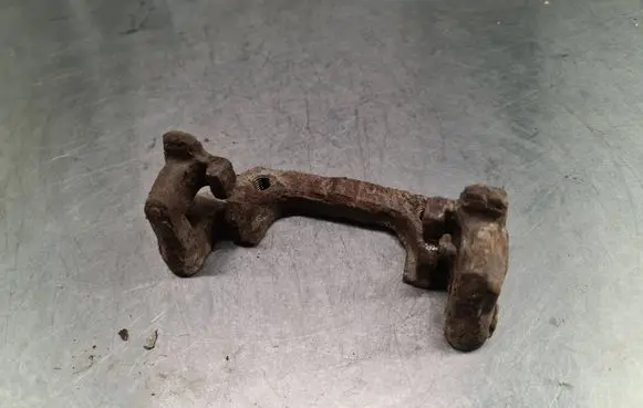 Saab 9-3 Ver2 Brake caliper pad carrier rear 