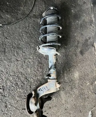 Ford Focus Front shock absorber with coil spring BV6118045AAC