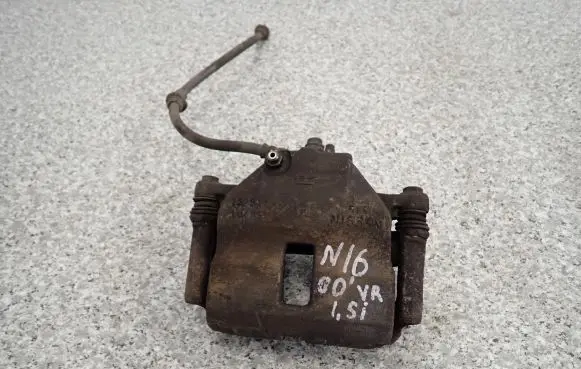 Nissan Almera N16 Front brake caliper