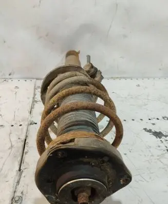Volkswagen Golf V Front shock absorber with coil spring