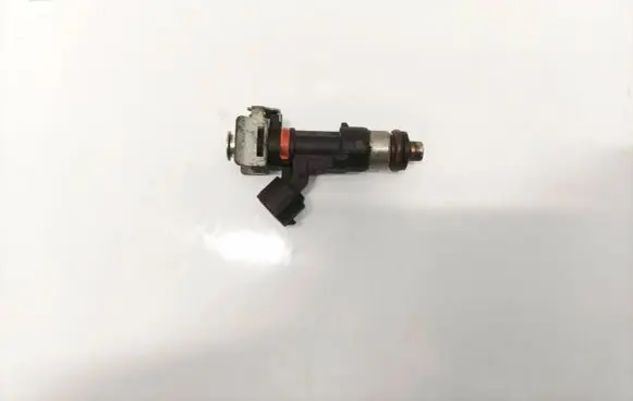 Nissan Micra Fuel injector 03110140