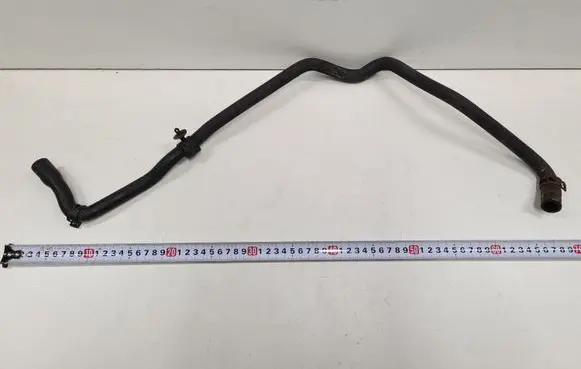 Volkswagen Touran I Engine coolant pipe/hose 110595T1
