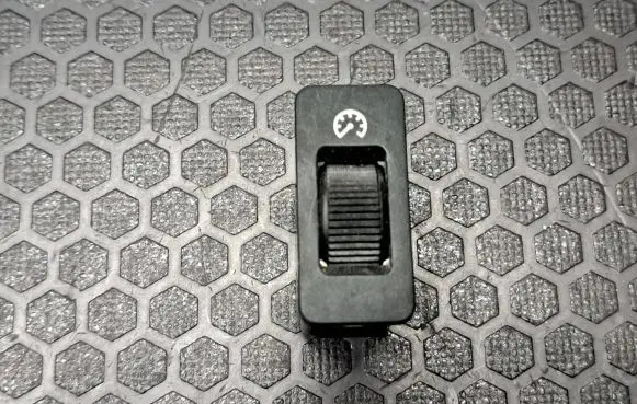 Panel lighting control switch