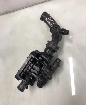 Thermostat/thermostat housing
