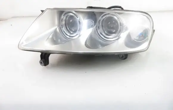 Volkswagen Touareg I Headlight/headlamp 7L6941015BK