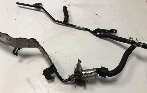 Volkswagen Golf VII Engine coolant pipe/hose 5Q0121064AS