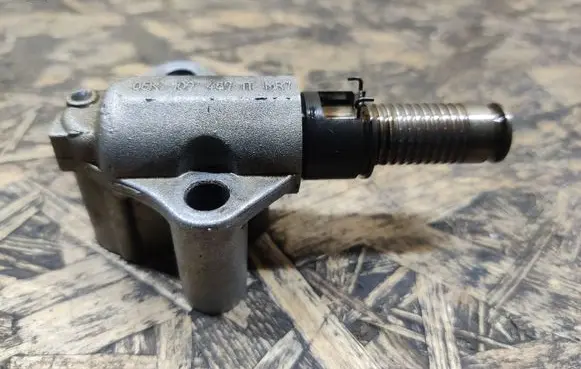 Volkswagen PASSAT B7 Timing belt/chain tensioner 06K109467