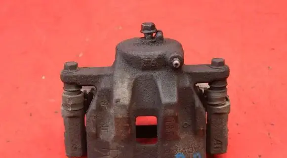 Suzuki Grand Vitara II Front brake caliper