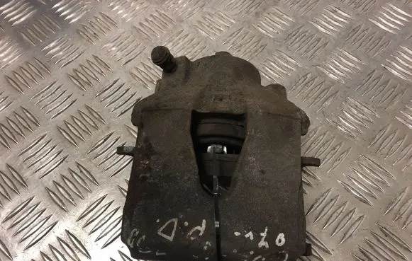 Volkswagen Golf V Front brake caliper