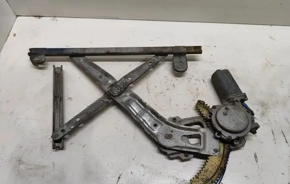 Subaru Impreza I Front door window regulator with motor 